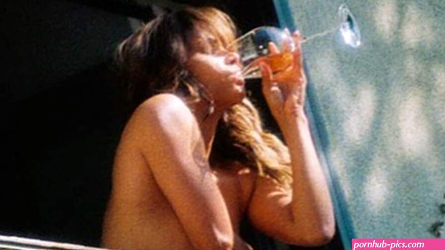 Halle Berry drinks wine naked on her balcony in Instagram photo