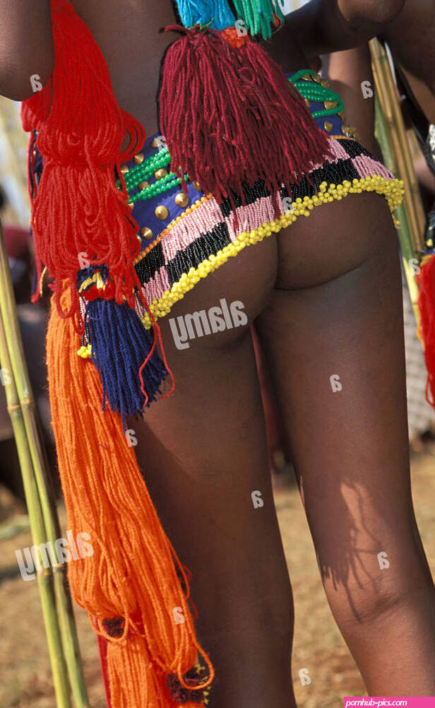 Underneath their skirts the girls are naked during the Umhlanga Stock Photo