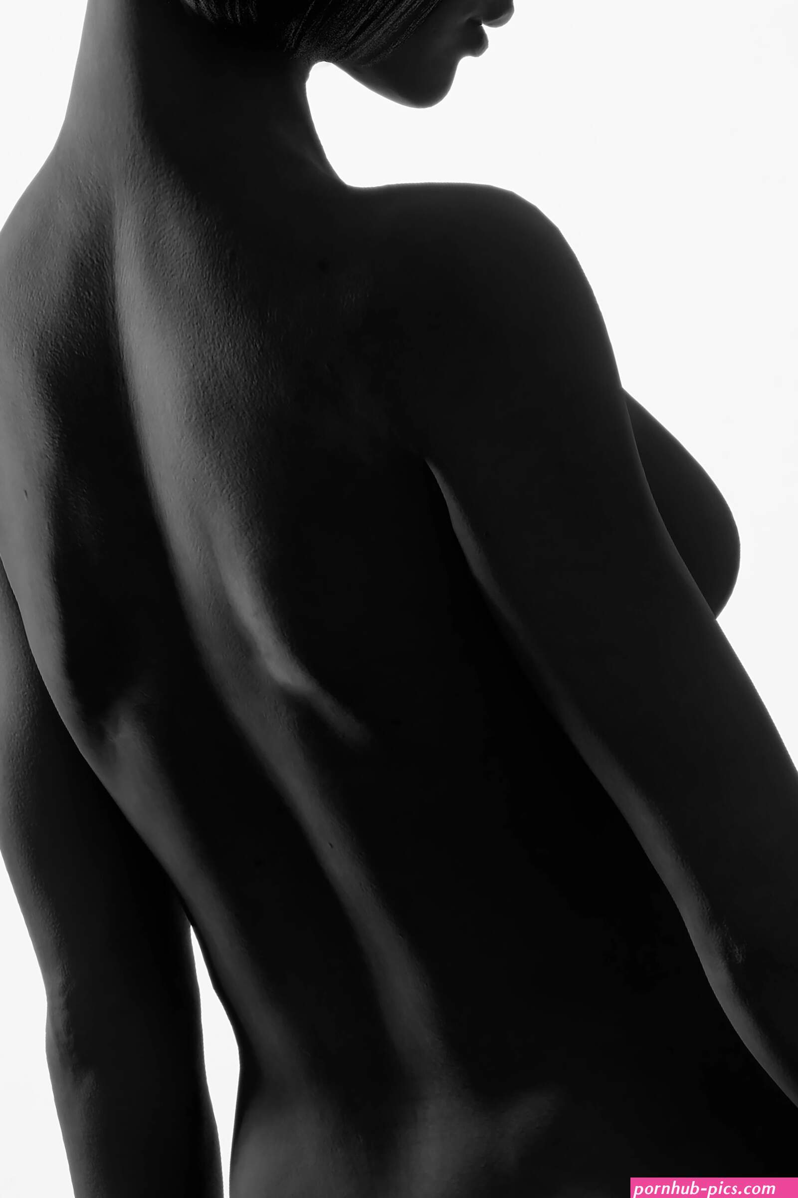 Silhouette of naked woman photo
