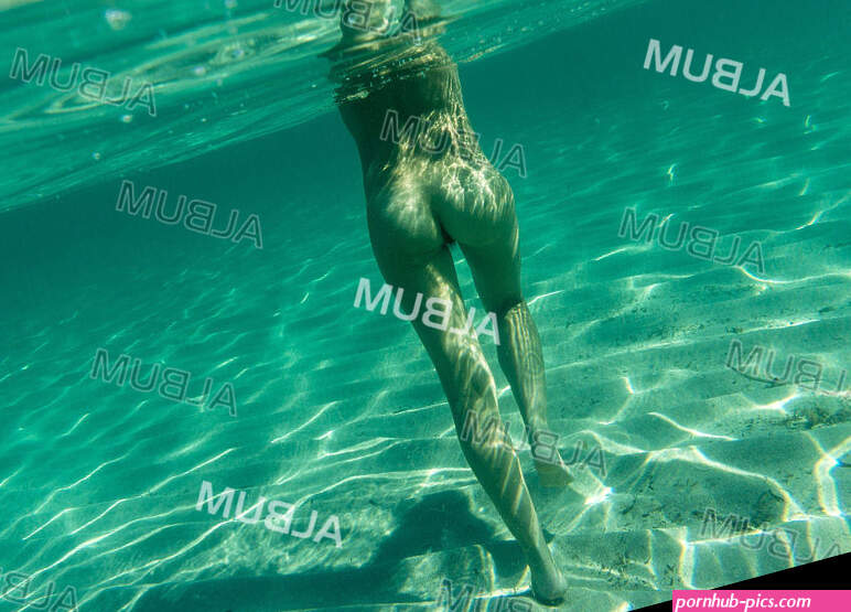 naked woman underwater Cala Torta Art Mallorca balearic islands spain europe.