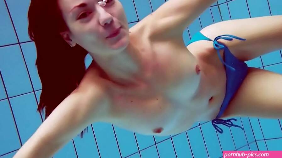 Hot teen Martina swims naked underwater