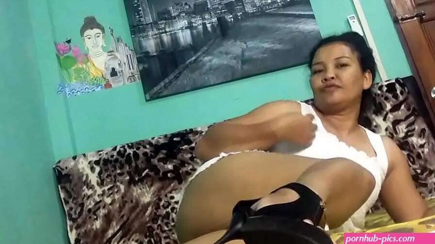 Astonishing Asian in high heels does some teasing