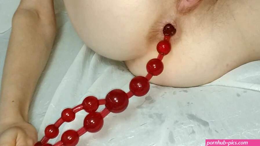 She took off the anal beads and inserted them VERY deep