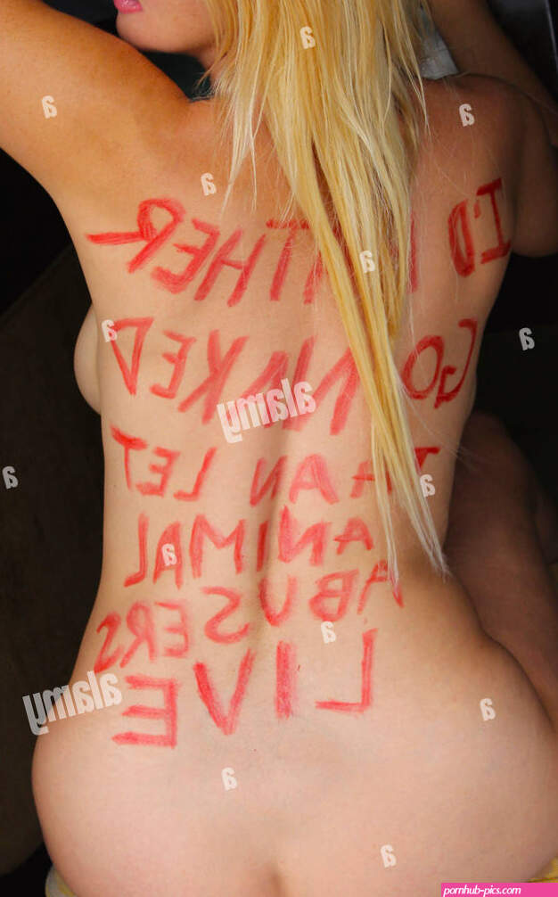 American singer Nadeea Volianova poses nude with the words Id Rather Go Naked Than Let Animal Abusers Live written across her back in red paint in response to the killing of Cecil