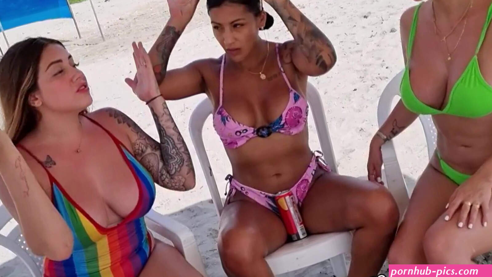 Lesbian threesome at public beach