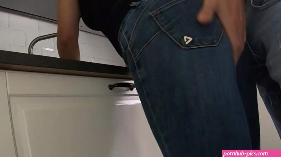 busy in the kitchen she is taken from behind... too sexy in tight jeans. STEP MOM ADVENTURE