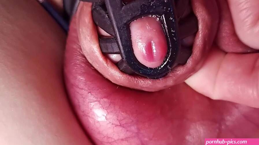 Super close up dick dripping pre cum in chastity cage
