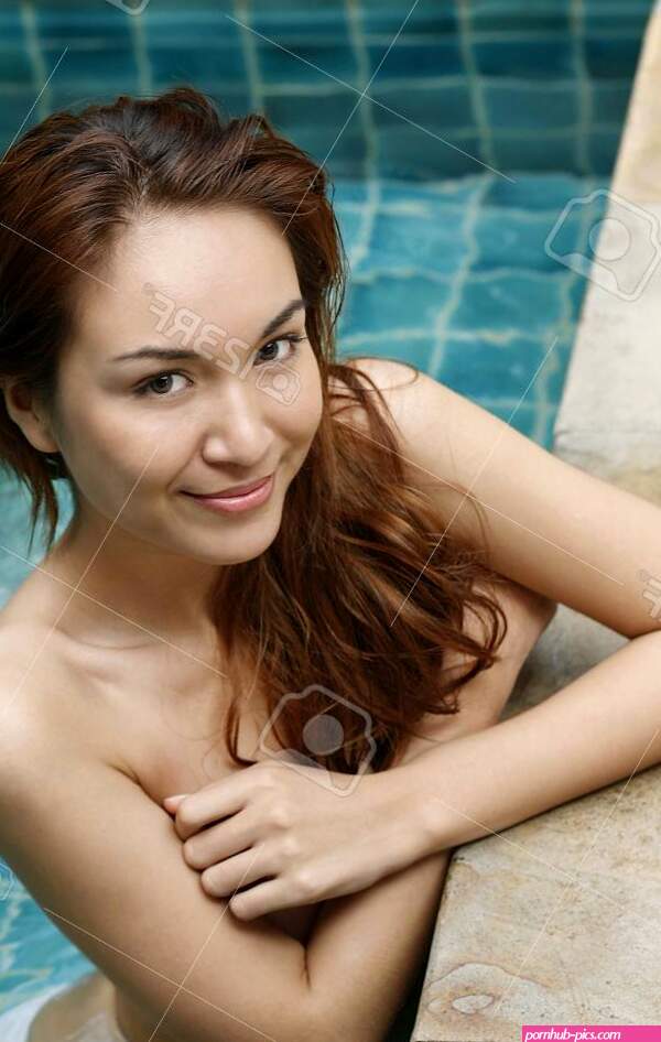 Topless Woman Covering Her Breast By The Swimming Pool Free Image and Photograph 39012456.