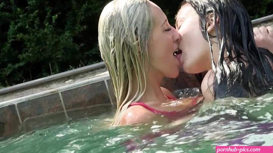 Blonde And Brunette Lesbians Have Sex By The Pool