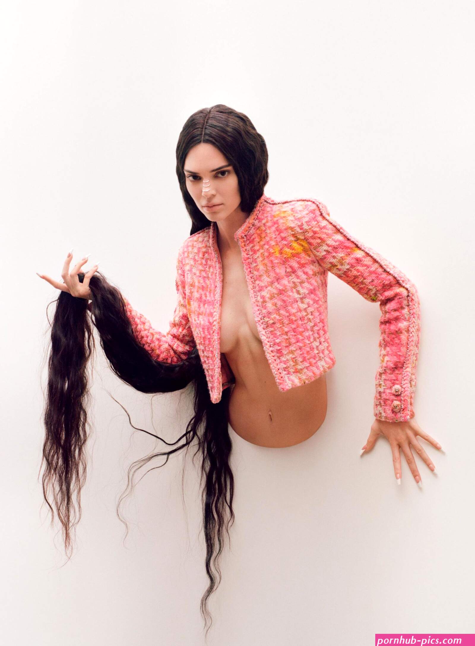 Kendall Jenner appears as topless wax model on magazine cover by viral banana artist