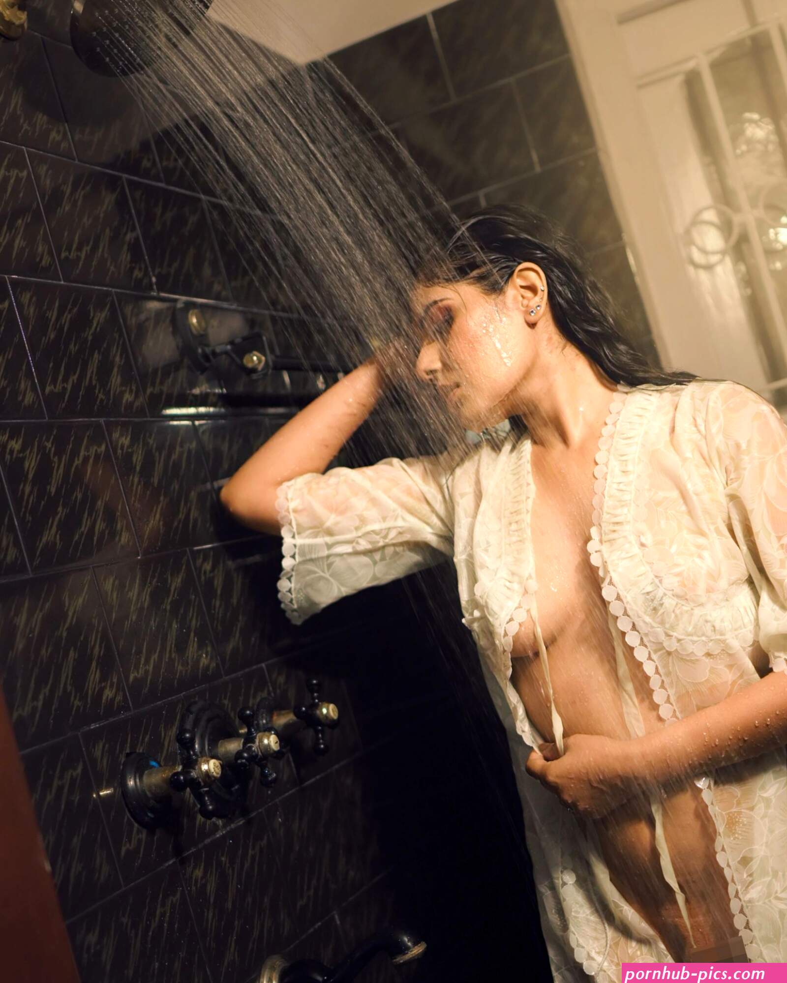 Desi lady showing her boobs and pussy through her wet transparent night dress inside a bathroom