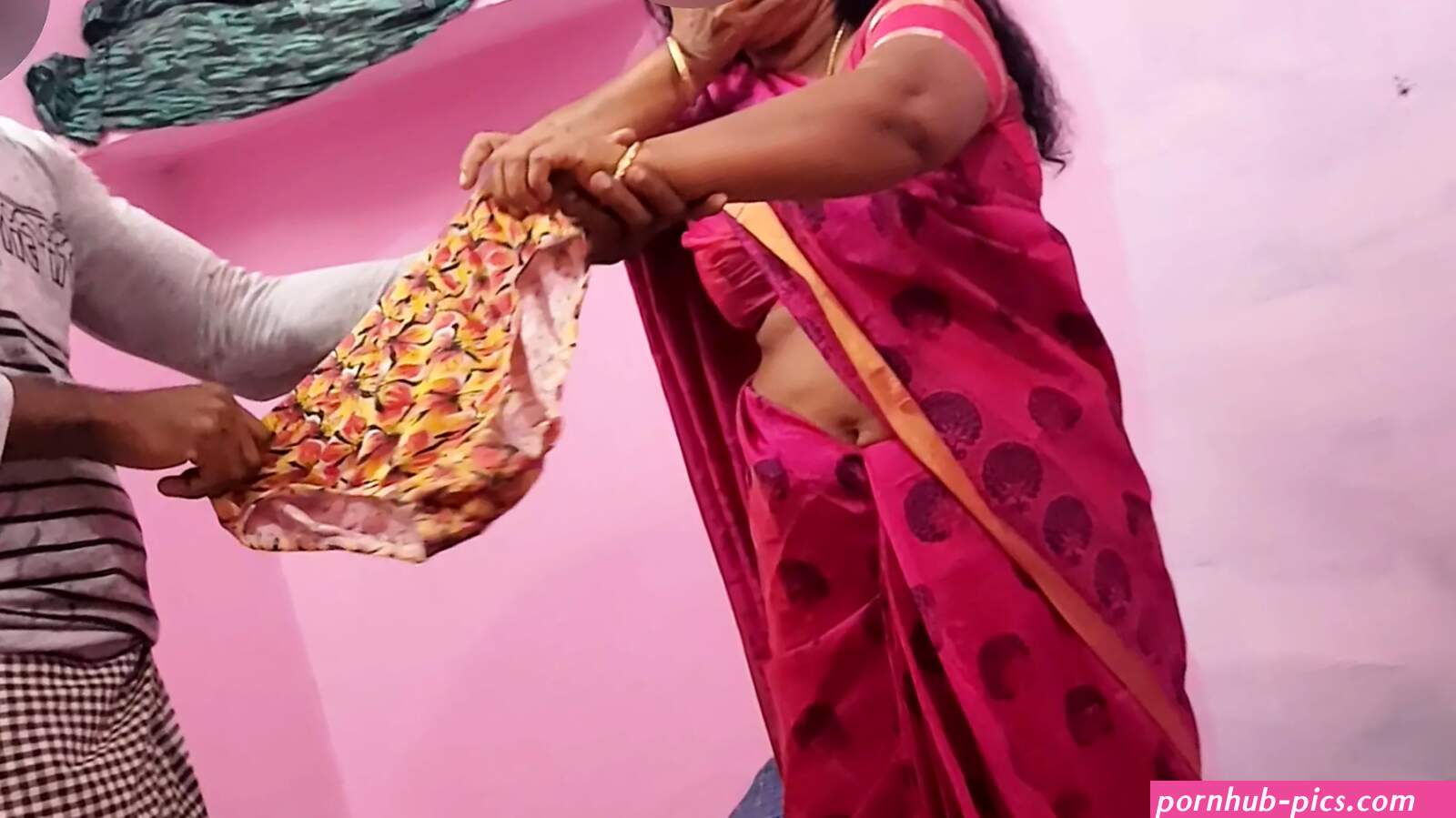 Aunty was bending down and reading something and I was playing with her panties behind her and she saw that I had sex with her.