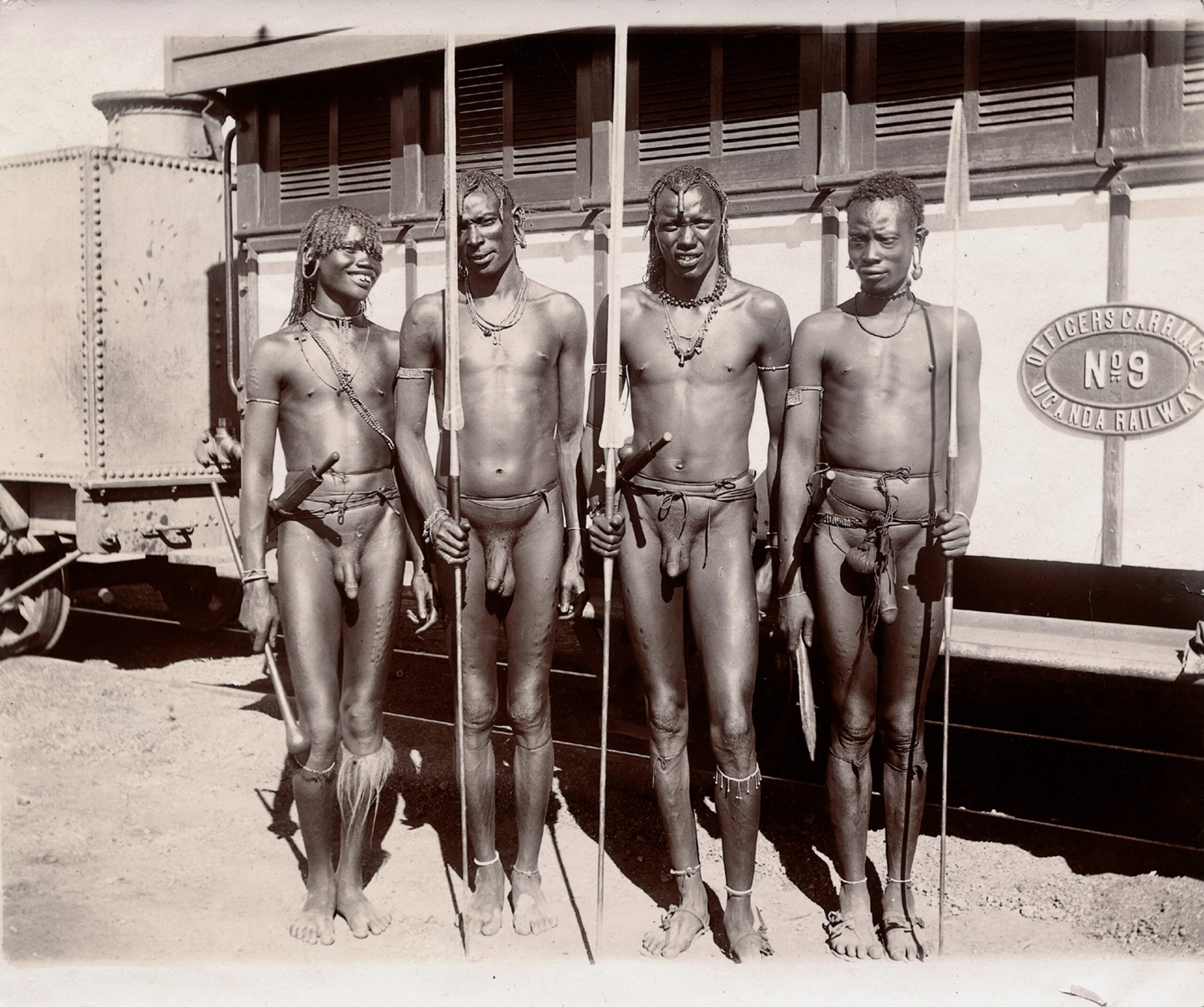 File:Four young Masai tribesmen carrying spears standing beside Wellcome V0048592.jpg