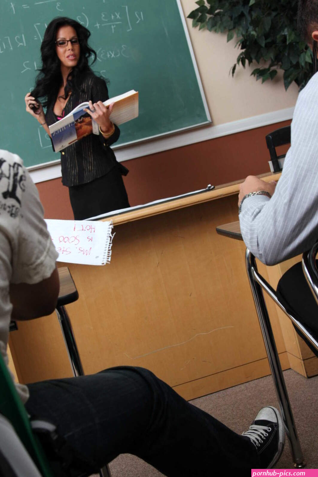 Brunette teacher makes the class clown fuck her in front of the class